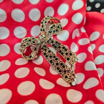 Spilla FIOCCO STRASS nera