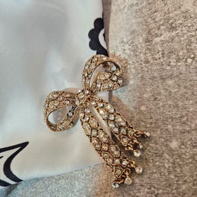 Spilla FIOCCO STRASS bianca
